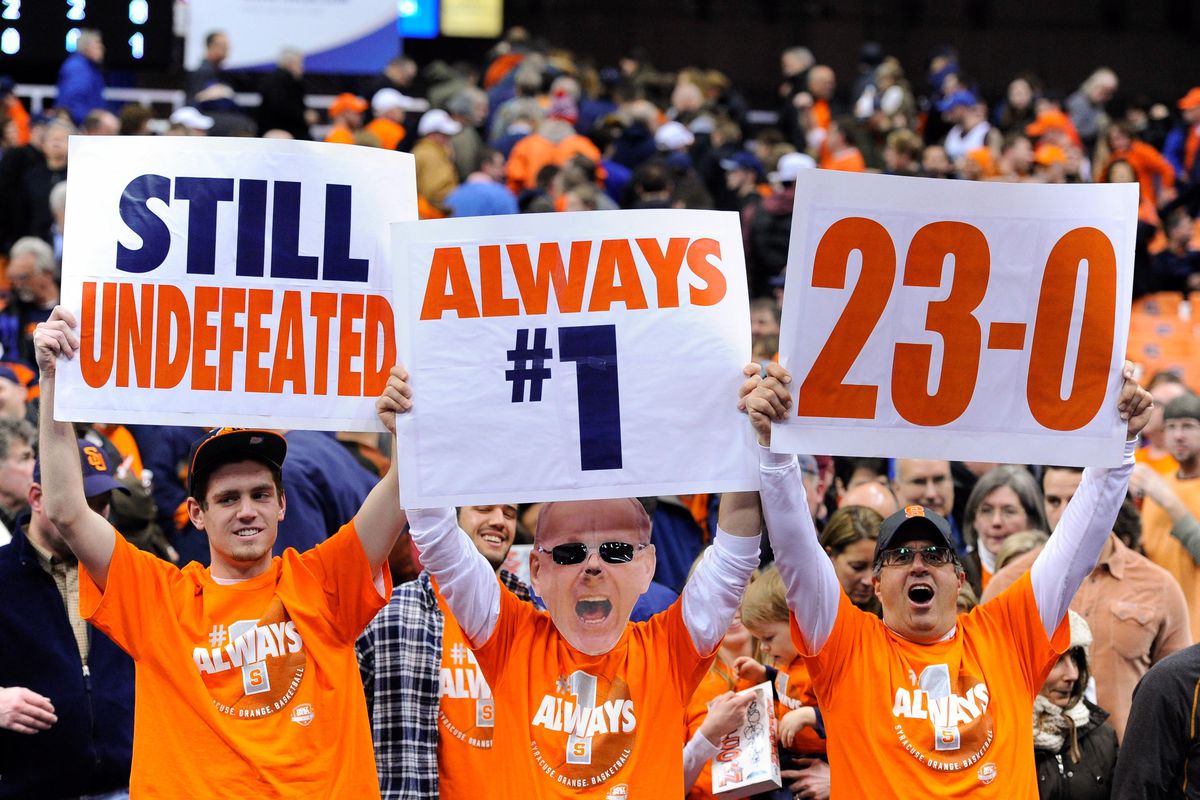 Syracuse Orange fans hold up signs following the game against the Clemson Tigers at the Carrier Dome. Syracuse defeated Clemson 57-44.
