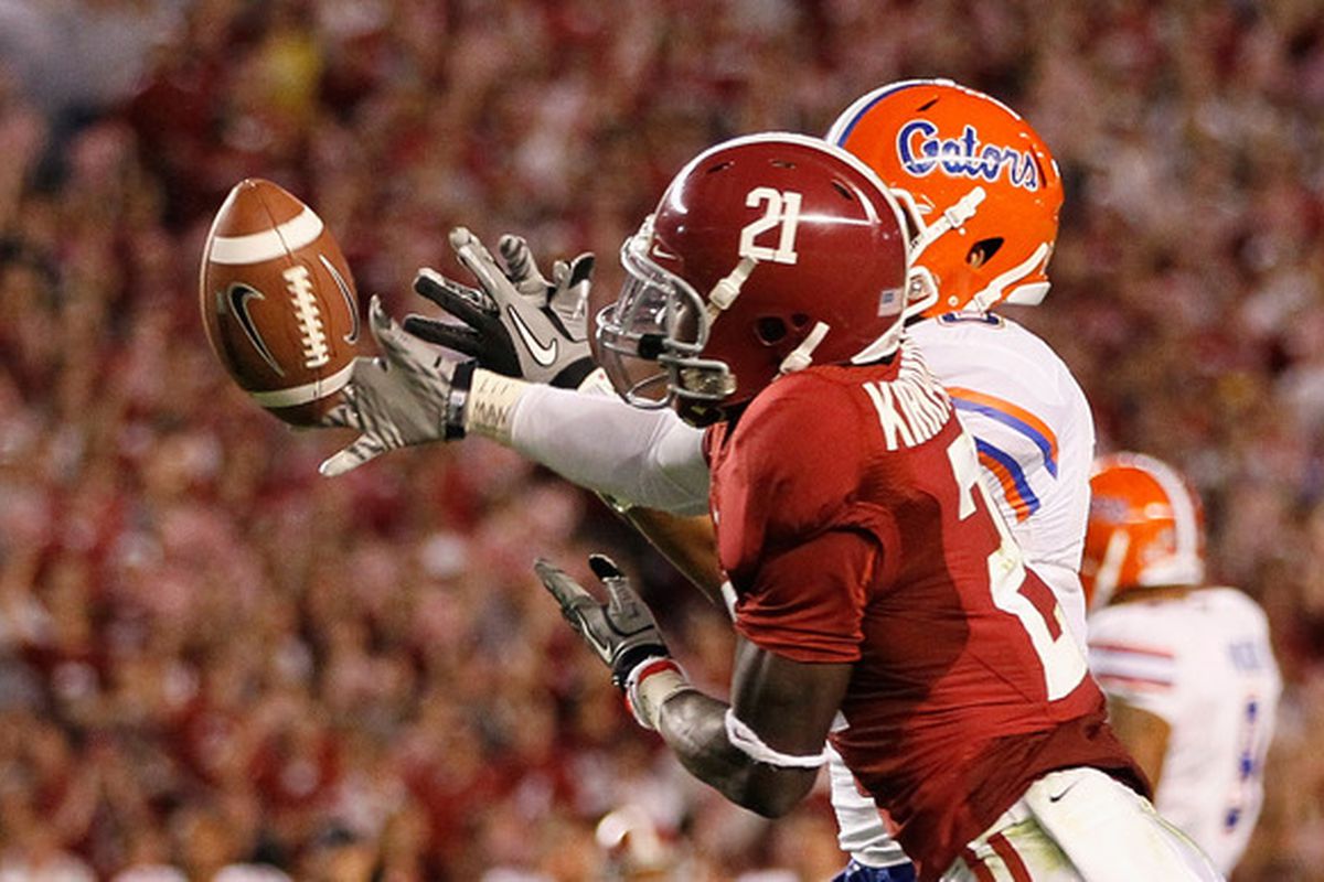 TUSCALOOSA AL - OCTOBER 02:  Dre Kirkpatrick #21 of the Alabama Crimson Tide intercepts a pass intended for Trey Burton #8 of the Florida Gators at Bryant-Denny Stadium on October 2 2010 in Tuscaloosa Alabama.  (Photo by Kevin C. Cox/Getty Images)