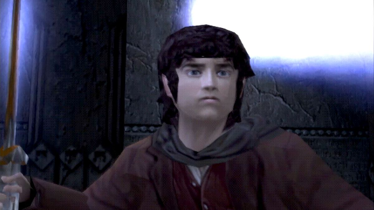A blocky Frodo raises Sting in The Lord of the Rings: The Two Towers for the Playstation 2.