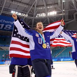 Gold medal winners the United States celebrate during the victory ceremony after defeating Canada in a shootout.