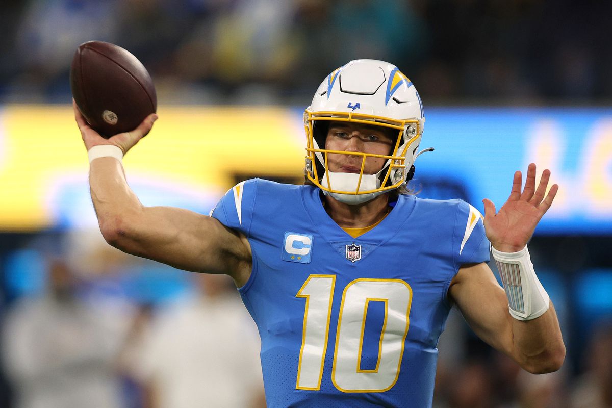 Justin Herbert #10 of the Los Angeles Chargers passes during a 23-17 win over the Miami Dolphins at SoFi Stadium on December 11, 2022 in Inglewood, California.