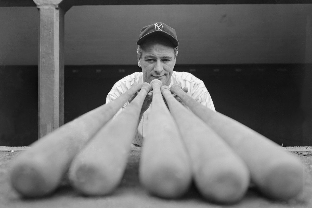 Lou Gehrig Examining Baseball Bats