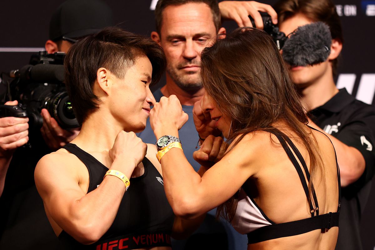Zhang Weili and Joanna Jedrzejczyk during weigh-ins for UFC 275. 