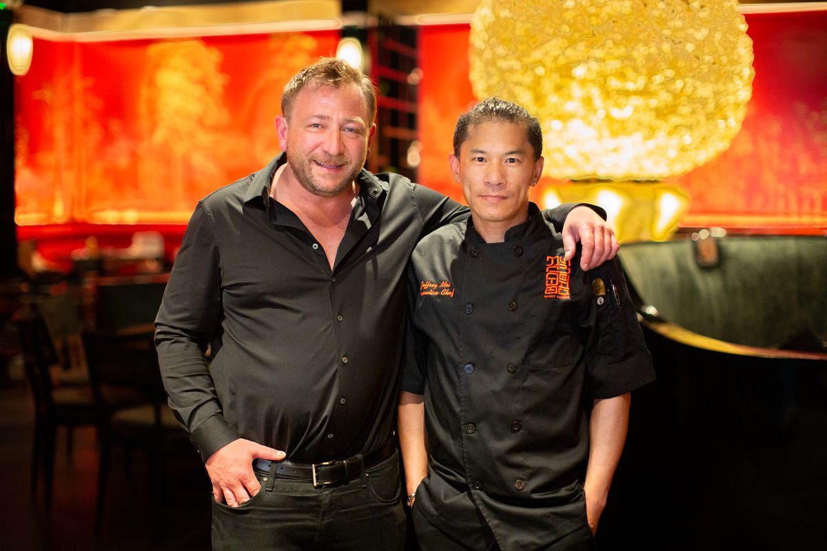 Berg Hospitality owner Ben Berg and chef Shirong Mei pose for a photo in the dining room of Benny Chows.