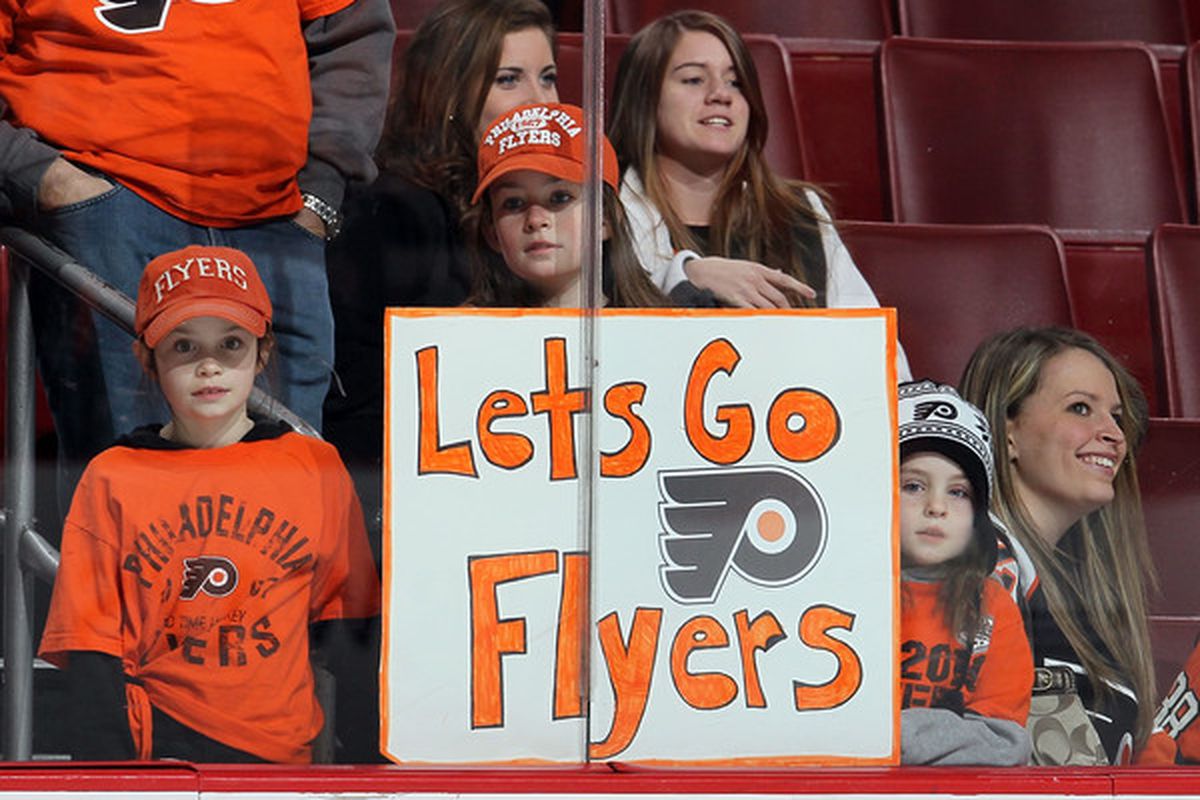 PHILADELPHIA PA - JANUARY 20:  Fans of the Philadelphia Flyers look on as their team warms up before playing against the Ottawa Senators on January 20 2011 at Wells Fargo Center in Philadelphia Pennsylvania.  (Photo by Jim McIsaac/Getty Images)
