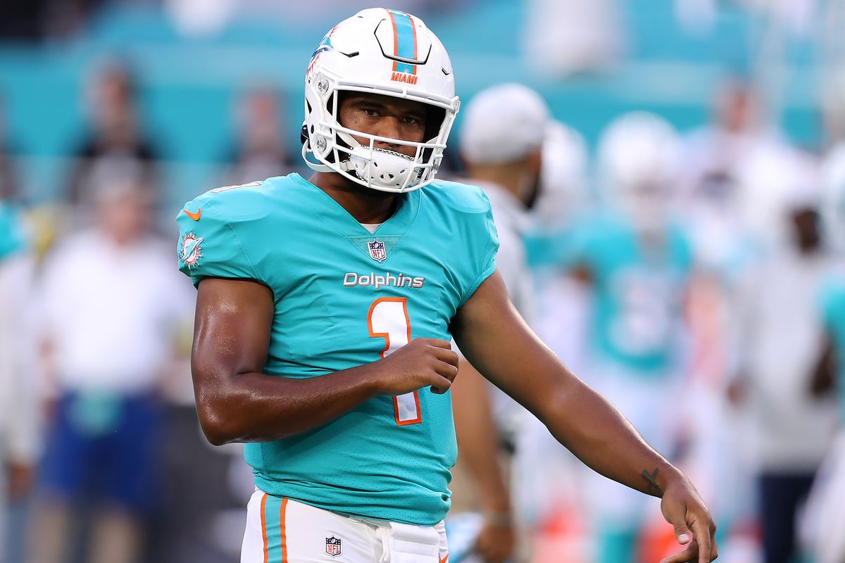 Tua Tagovailoa #1 of the Miami Dolphins warms up prior to playing the Las Vegas Raiders at Hard Rock Stadium on August 20, 2022 in Miami Gardens, Florida.