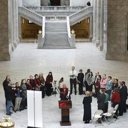 Lacee Harris, a Native American shaman, conducts a "blessing ceremony" to mark the first day of Interfaith Month at the Utah State Capitol in Salt Lake City on Friday, Feb.1, 2013.