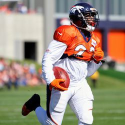 Running back C.J. Anderson completes an individual drill at Broncos camp.
