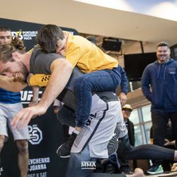 Brian Ortega has fun with a fan at UFC 231 workouts.