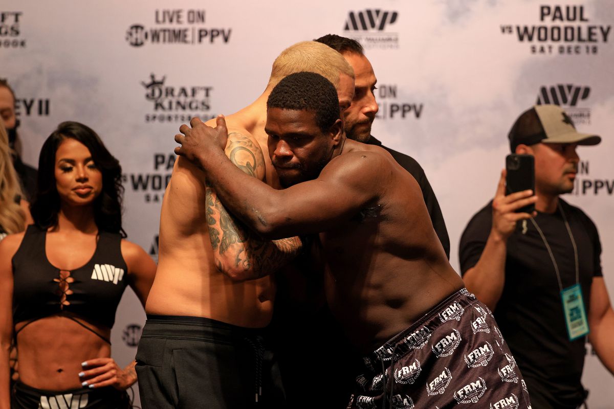 Deron Williams and Frank Gore pose during a weigh in at the Hard Rock Hotel and Casino ahead of this weekends fight on December 17, 2021 in Tampa, Florida.