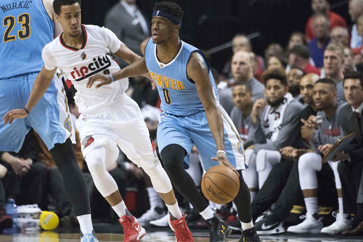 Emmanuel Mudiay of the Denver Nuggets dribbles during the season finale against the Portland Trailblazers.