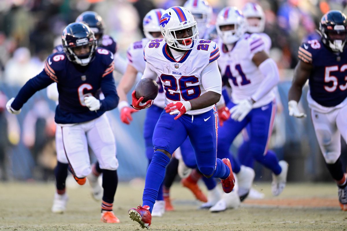 Devin Singletary #26 of the Buffalo Bills runs the ball during the second half in the game against the Chicago Bears at Soldier Field on December 24, 2022 in Chicago, Illinois.