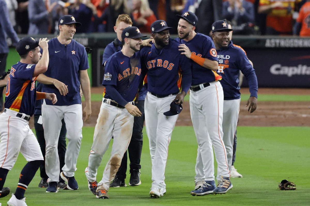 Yordan Alvarez of the Houston Astros celebrates with teammates after defeating the Philadelphia Phillies 4-1 to win the 2022 World Series in Game Six of the 2022 World Series at Minute Maid Park on November 05, 2022 in Houston, Texas.