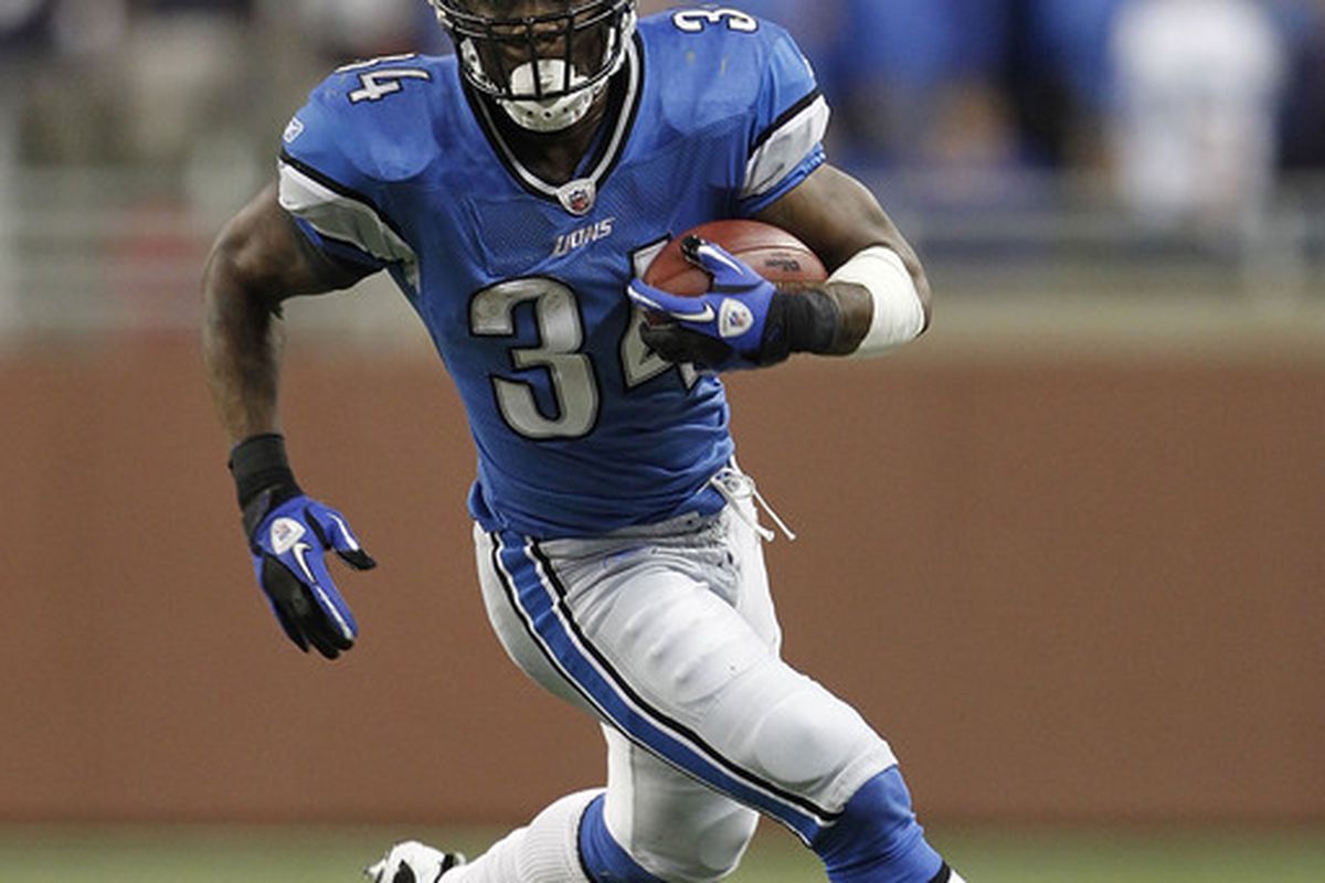 Kevin Smith of the Detroit Lions runs for a first down during the fourth quarter of the game against the Washington Redskins.