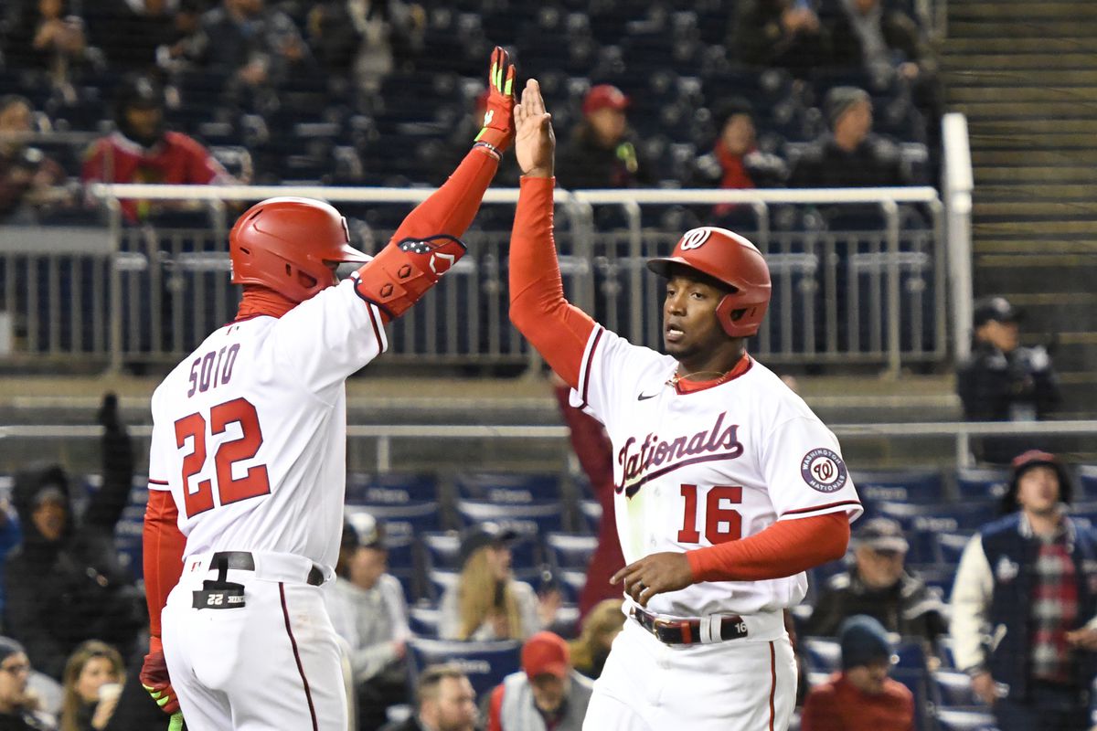 Victor Robles #16 of the Washington Nationals celebrates scoring a run with Juan Soto #22 on Cesar Hernandez #1 double in the sixth inning during game two of a doubleheader baseball game against the Arizona Diamondbacks at the Nationals Park on April 19, 2022 in Washington, DC.