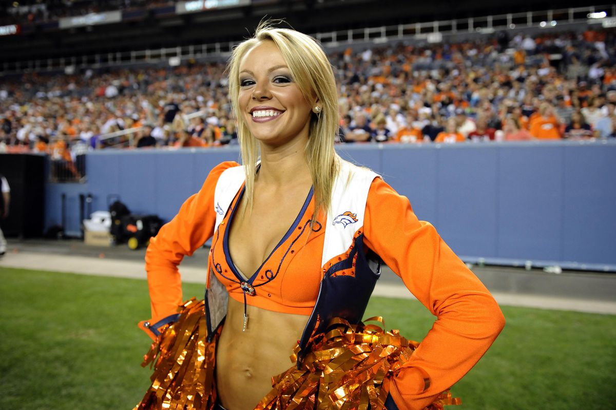 Hey this is a Fantasy Football post so what better than to have a Denver Broncos cheerleader posing on it. Mandatory Credit: Ron Chenoy-US PRESSWIRE
