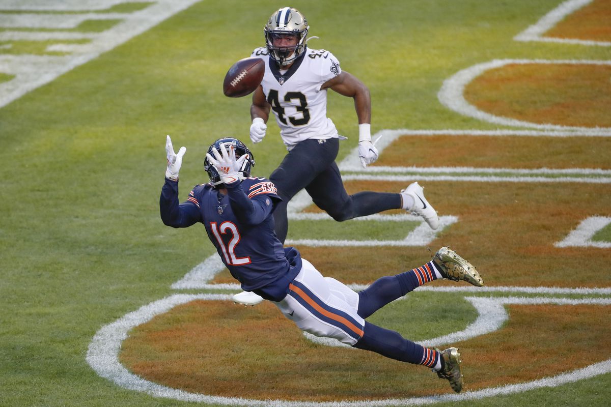 Bears receiver Allen Robinson dives for a ball against the Saints.