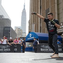 Kyoji Horiguchi shadowboxes to warm up for his Bellator 222 open workout 