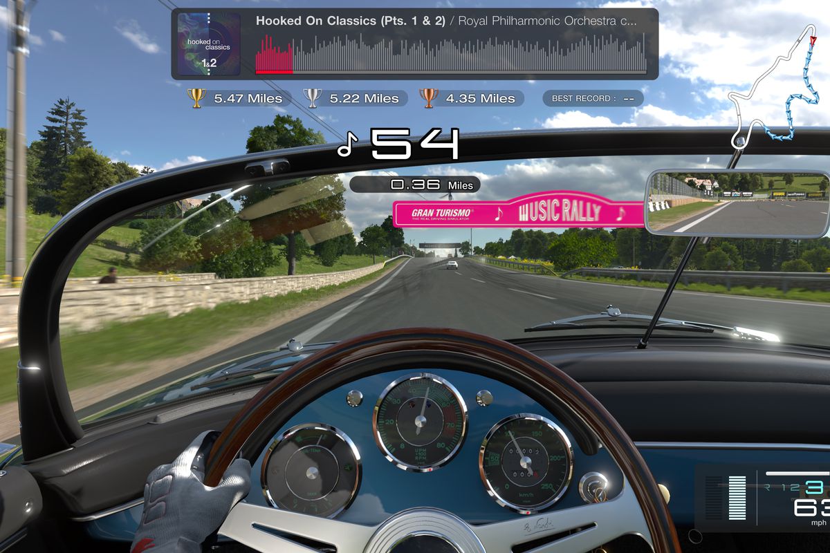 First person driver’s seat view of Gran Turismo 7’s Music Rally mode