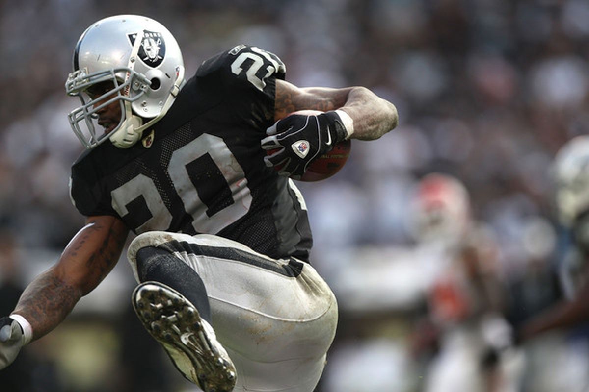 OAKLAND CA - NOVEMBER 07:  Darren McFadden #20 of the Oakland Raiders runs against the Kansas City Chiefs during an NFL game at Oakland-Alameda County Coliseum on November 7 2010 in Oakland California.  (Photo by Jed Jacobsohn/Getty Images)