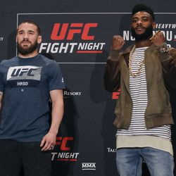 Jimmie Rivera and Aljamain Sterling pose on stage Friday at UFC Phoenix media day.