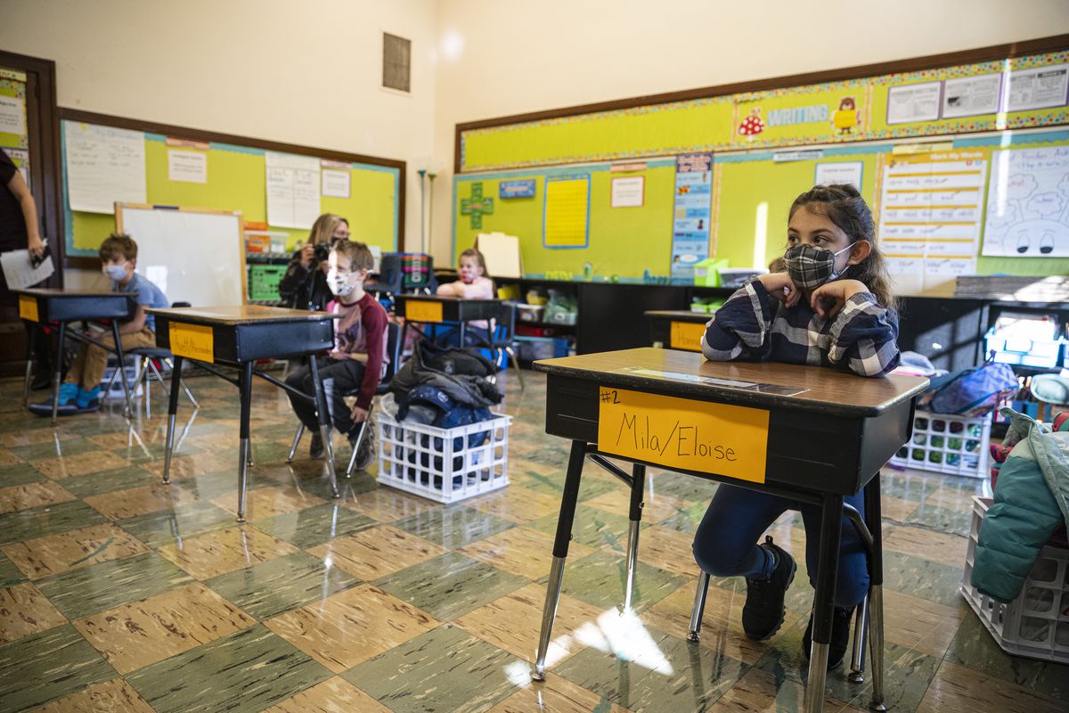 A Student sits in class at Hawthorne Scholastic Academy at 3319 N Clifton Ave in Lakeview, Monday, March 1, 2021