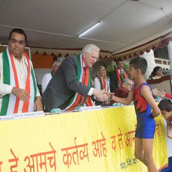 Elder D. Todd Christofferson, a member of the Quorum of Twelve Apostles for The Church of Jesus Christ of Latter-day Saints, center, greets students after their yoga performance during the 71st Independence Day celebrations at the MIT World Peace University in Pune, Maharashtra, India, on August 15, 2017.