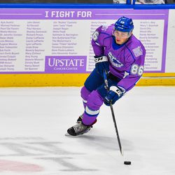 Syracuse Crunch Mitch Hults (86) wearing the special Hockey Fights Cancer jersey against the Laval Rocket in American Hockey League (AHL) action at the War Memorial Arena in Syracuse, New York on Saturday, November 17, 2018. Syracuse won 6-4.