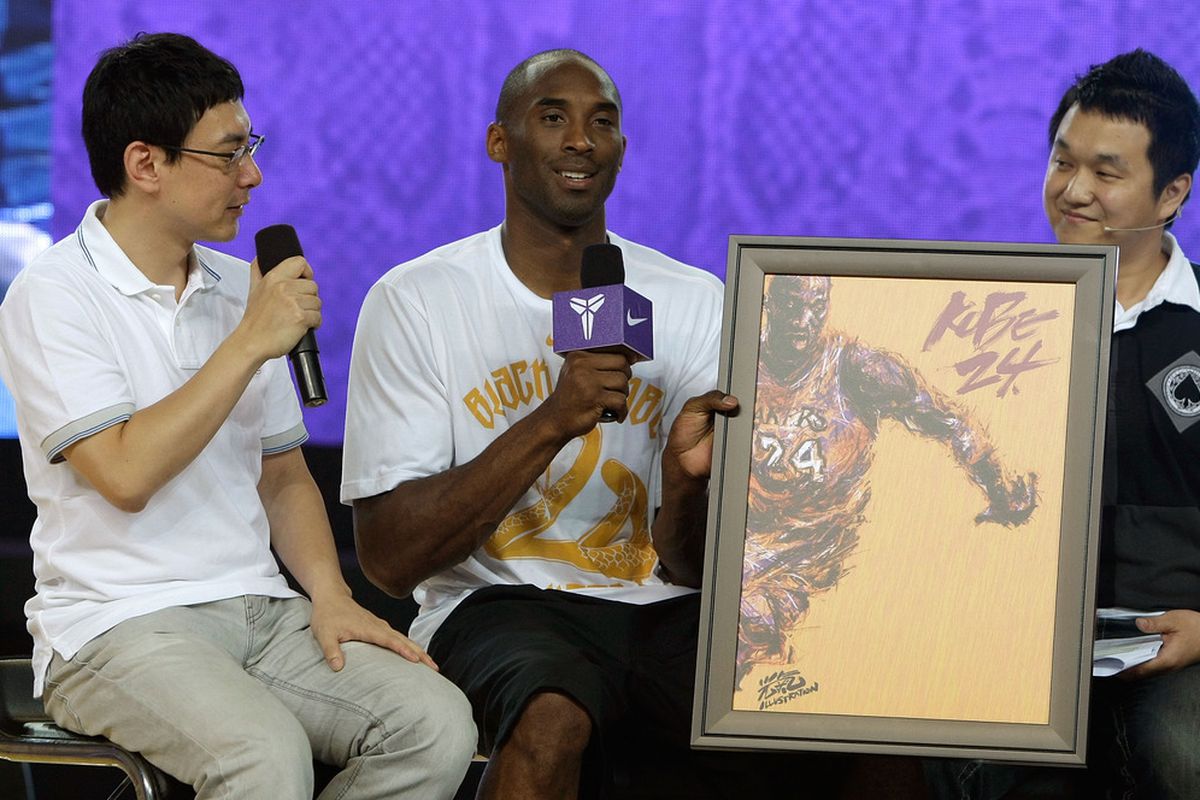 SEOUL, SOUTH KOREA - JULY 14:  NBA player Kobe Bryant #24 of the Los Angeles Lakers talks with fans during a promotional tour of South Korea at the Korea University on July 14, 2011 in Seoul, South Korea.  (Photo by Chung Sung-Jun/Getty Images)