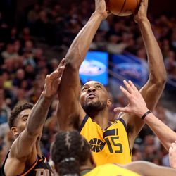 Utah Jazz forward Derrick Favors (15) shoots during a basketball game against the Phoenix Suns at the Vivint Smart Home Arena in Salt Lake City on Wednesday, Feb. 14, 2018. Jazz won 107-97.