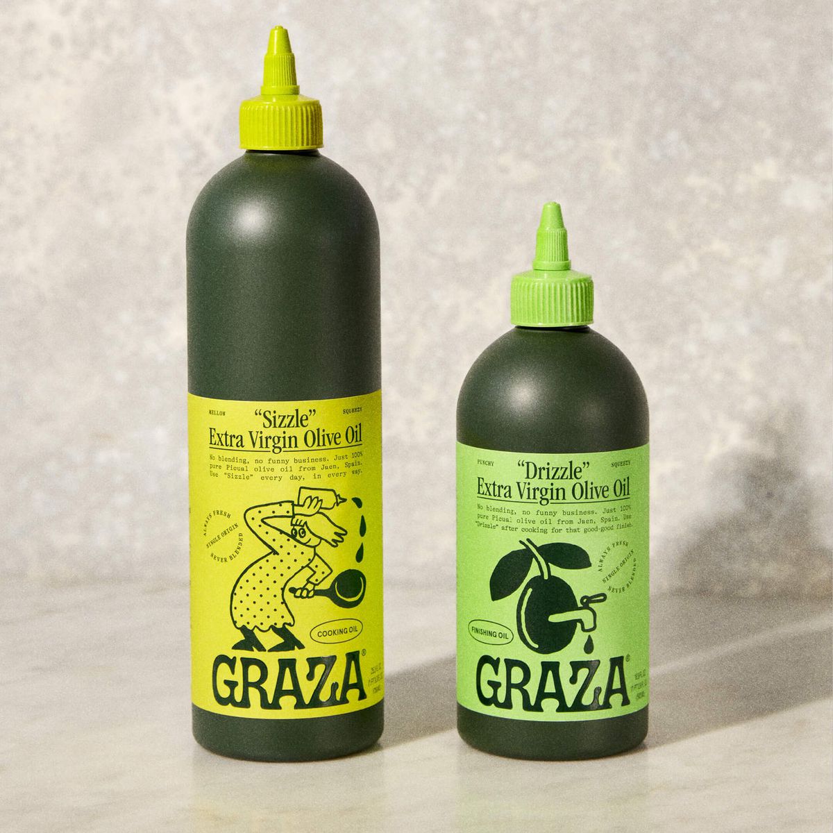 Two bottles of Graza olive oil