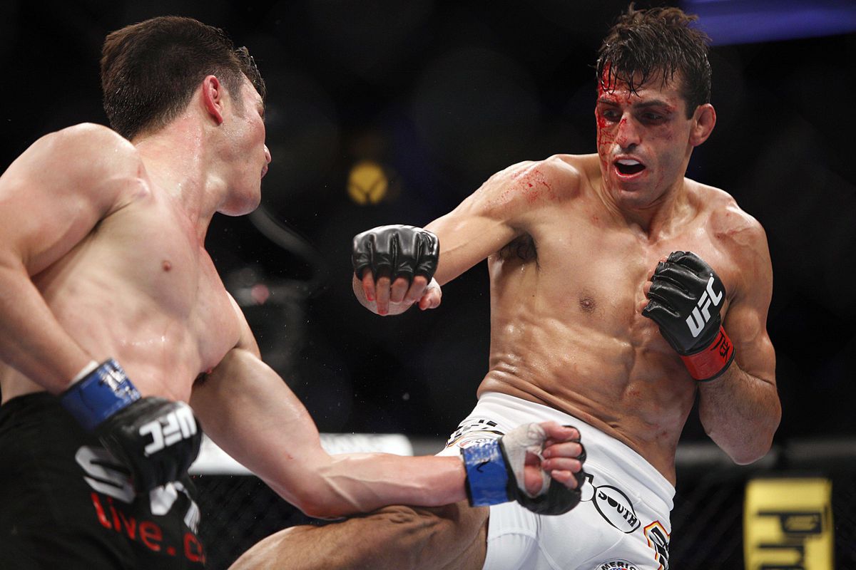 Sotiropoulos (right) in his last UFC fight, versus K.J. Noons