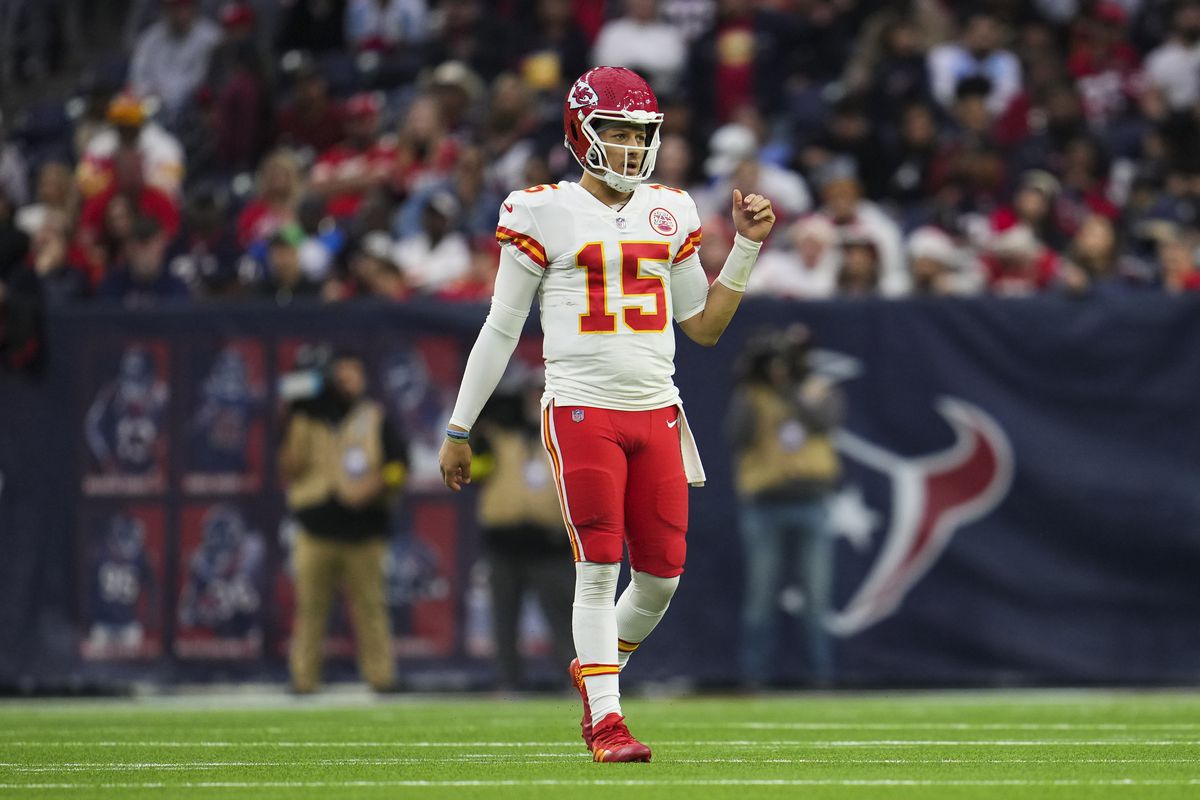 Patrick Mahomes #15 of the Kansas City Chiefs looks down field against the Houston Texans at NRG Stadium on December 18, 2022 in Houston, Texas.