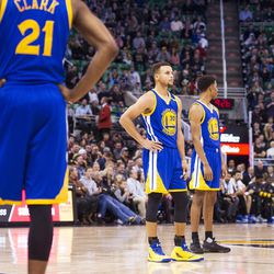 Golden State guard Stephen Curry (30) waits for a Utah player to shoot a free-throw after Kevin Durant received a technical foul during the second half of an NBA basketball game against Utah in Salt Lake City on Thursday, Dec. 8, 2016. Golden State defeated Utah with a final score of 106-99.