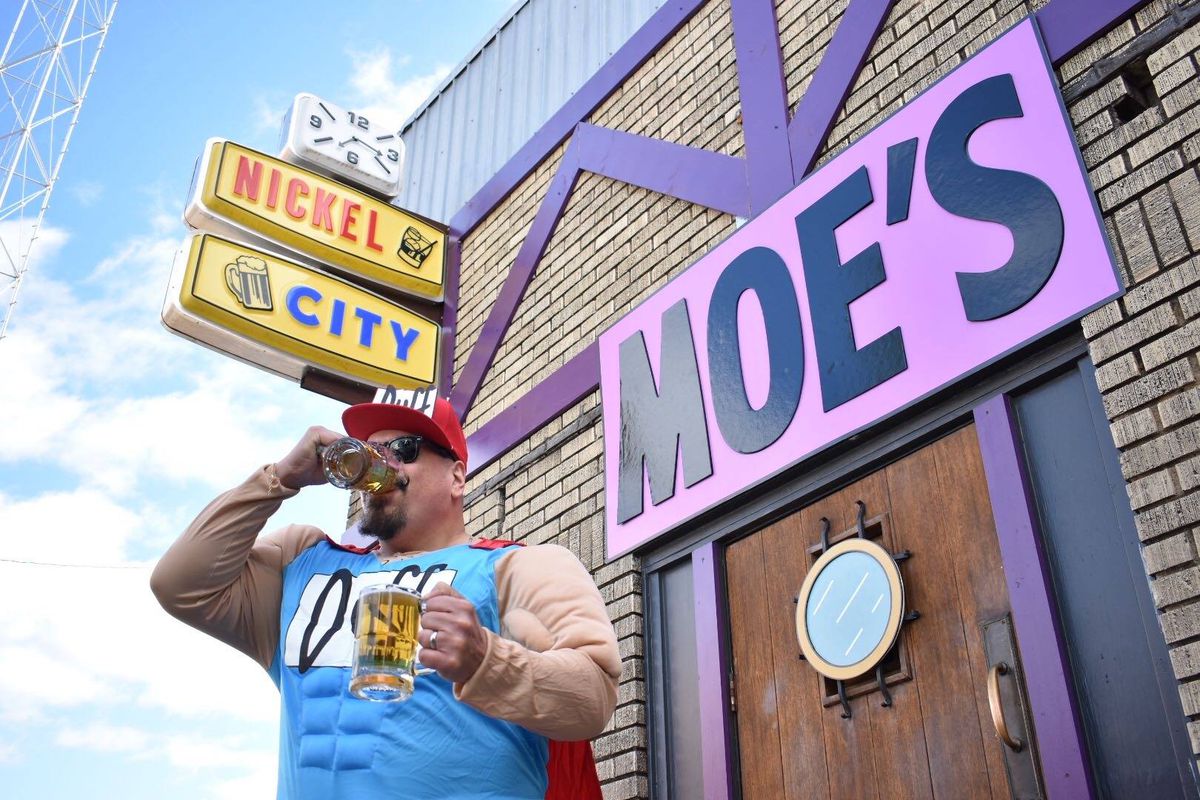 Duffman in front of Nickel City as Moe’s Tavern