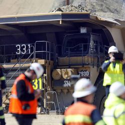 A haul truck carries up to 340 tons of material during a media tour of Kennecott's Bingham Canyon Mine on Thursday, April 25, 2013.