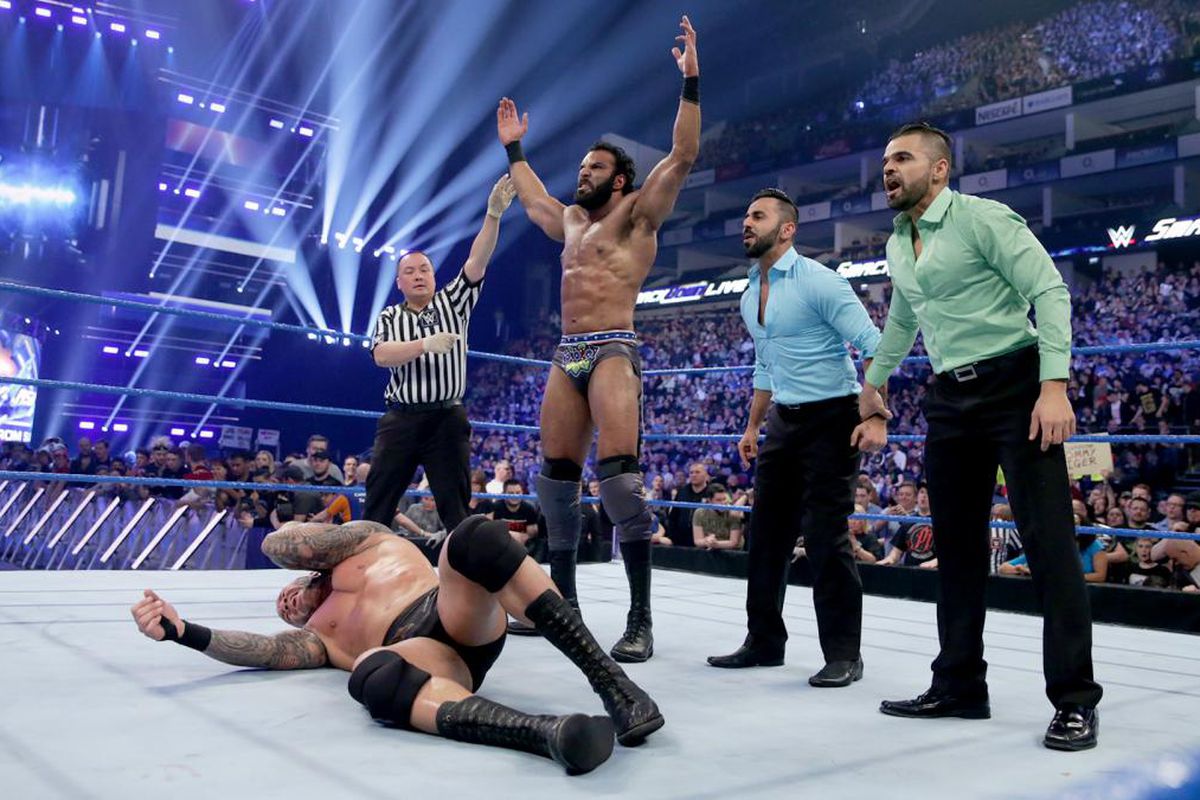 Jinder Mahal and The Singh Brothers stand tall over WWE Champion Randy Orton