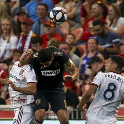 Real Salt Lake defender Aaron Herrera (22) and Philadelphia Union midfielder Alejandro Bedoya (11) collide during a header in the first half of a game at Rio Tinto Stadium in Sandy on Saturday, July 13, 2019.