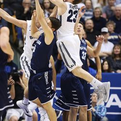 Brigham Young Cougars guard Skyler Halford (23) grabs a rebound in Provo Thursday, Feb. 19, 2015. 