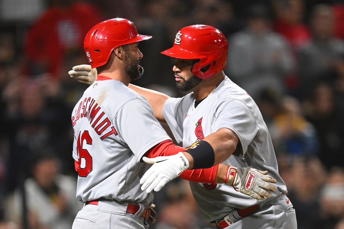 Albert Pujols of the St. Louis Cardinals celebrates his two-run home run with Paul Goldschmidt during the sixth inning against the Pittsburgh Pirates at PNC Park on October 3, 2022 in Pittsburgh, Pennsylvania.