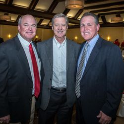 FILE - From left to right, Utah baseball coach Bill Kinneberg, athletics director Dr. Chris Hill, and Kansas Royals manager Ned Yost post for a picture at Ute baseball fundraiser at the Sheraton in Salt Lake City, Utah, Tuesday, Feb. 10, 2016.