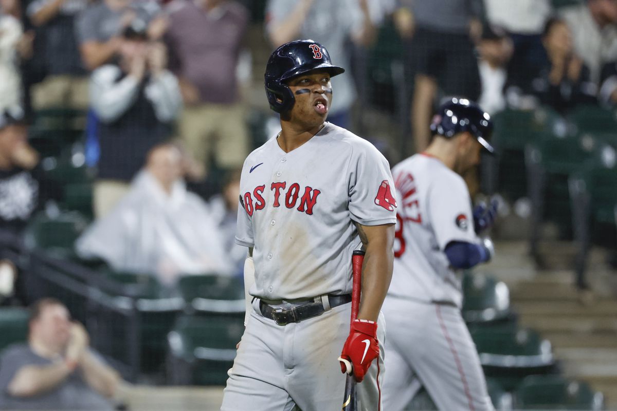 Boston Red Sox third baseman Rafael Devers (11) reacts after striking out against the Chicago White Sox during the ninth inning at Guaranteed Rate Field.