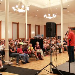 Authors Brandon Mull and Shannon Hale speak at a young adult event at the Provo City Library.