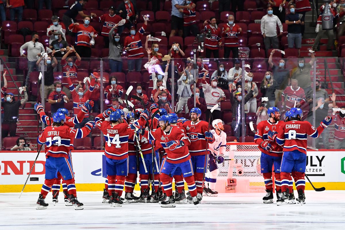 Montreal Canadiens celebrate after defeating the Tampa Bay Lightning in Game 4 of the Stanley Cup Final of the 2021 Stanley Cup Playoffs at the Bell Centre on July 5, 2021 in Montreal, Quebec, Canada.