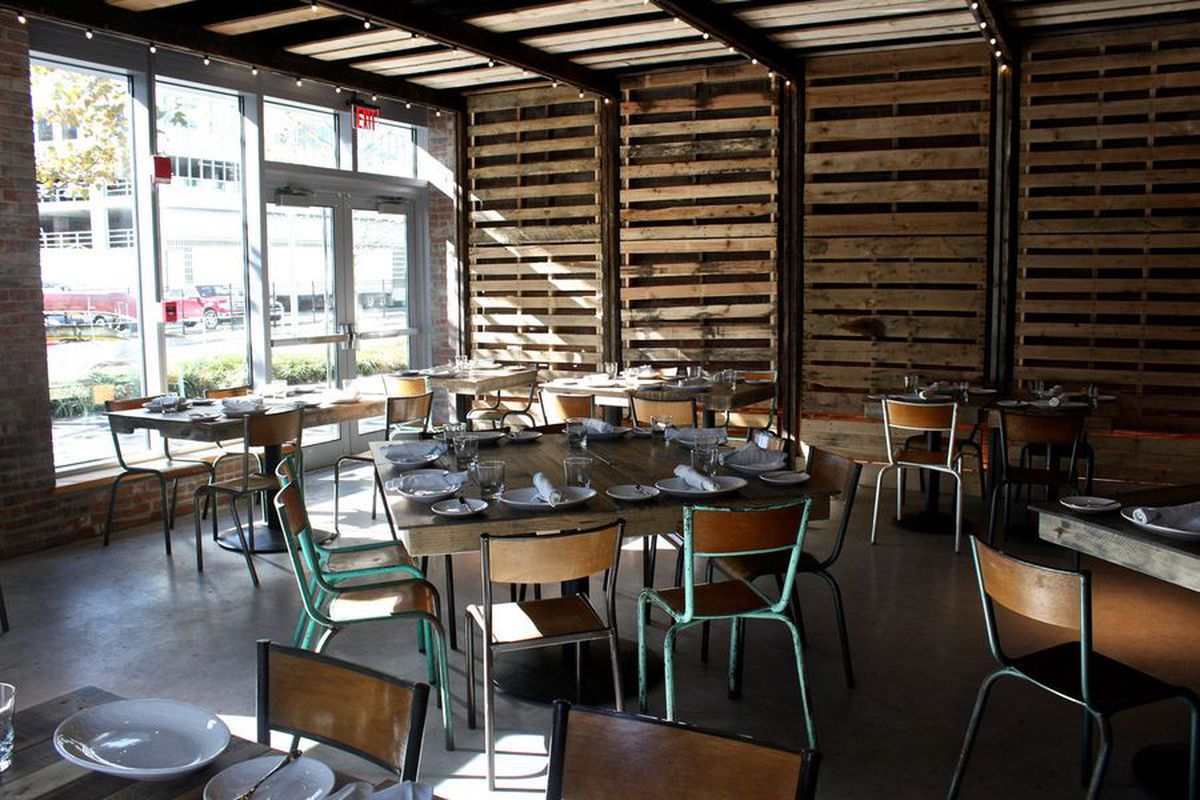 Restaurant interior full of wood beams