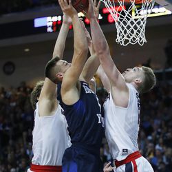 Brigham Young Cougars guard Kyle Collinsworth (5) has his shot blocked by Gonzaga Bulldogs forward Domantas Sabonis (11) during the WCC tournament in Las Vegas Monday, March 7, 2016. BYU lost 88-84.