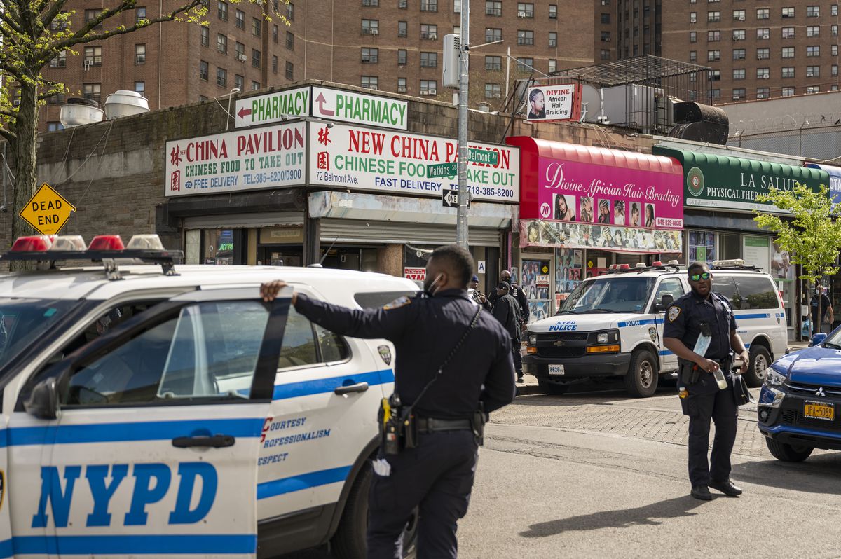 NYPD officers at Watkins Street and Belmont Avenue in Brownsville, Brooklyn. Friday, April 30, 2021.