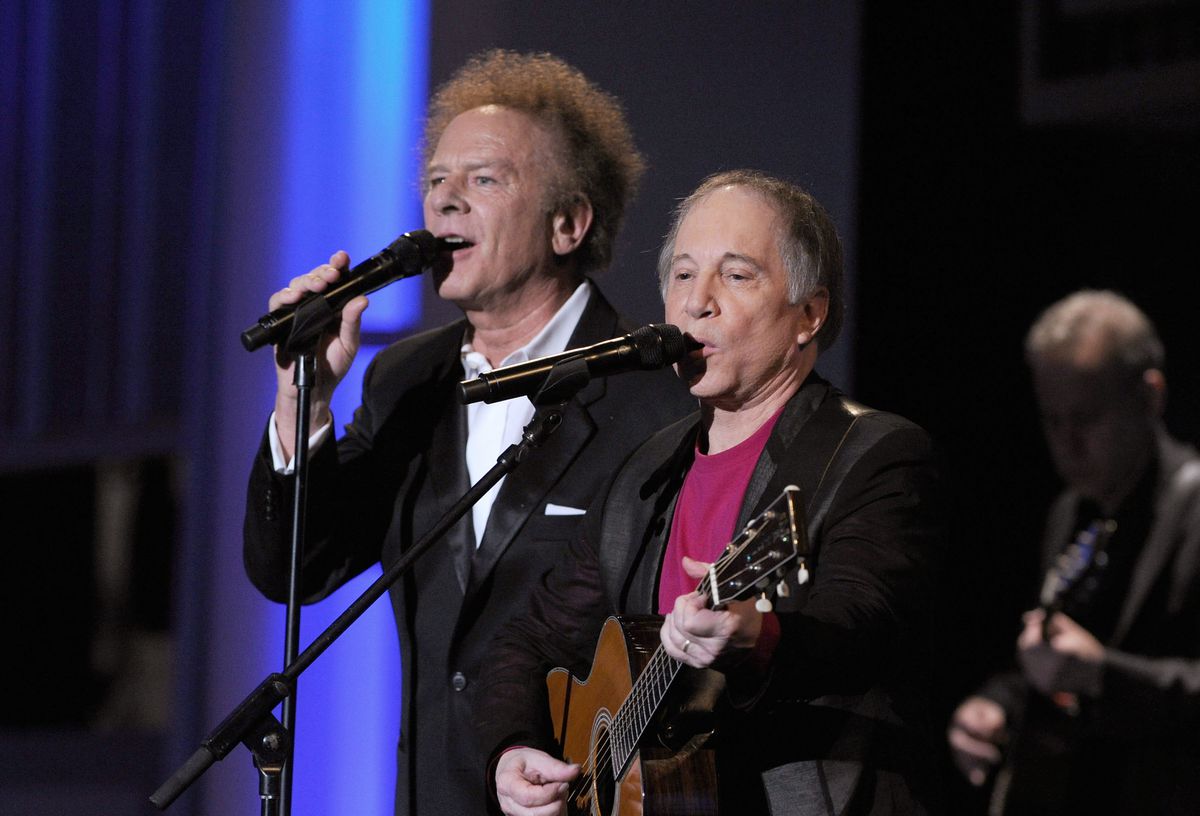 Art Garfunkel and Paul Simon performing