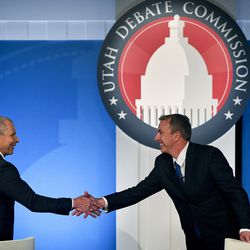 Rep. John Curtis, left, and Chris Herrod shake hands at the start of Utah's Republican primary debate for the 3rd Congressional District seat on Tuesday, May 29, 2018, at KBYU on the campus of Brigham Young University in Provo.