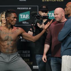 Israel Adesanya squares off with Anderson Silva at UFC 234 weigh-ins.